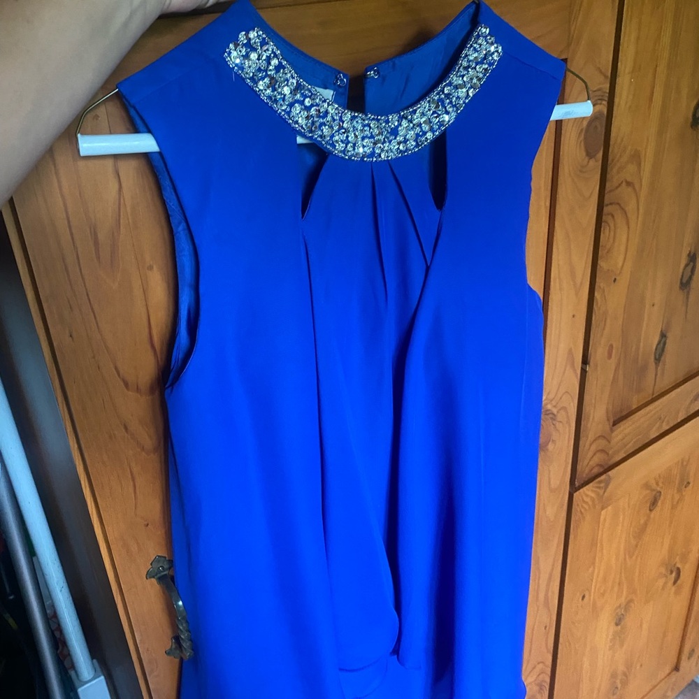 Brand new never worn US size 0 & 2! TS Couture